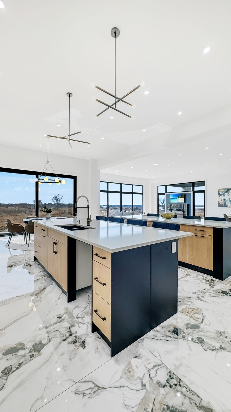 Chef's kitchen with statement island in a completed Carnaby home