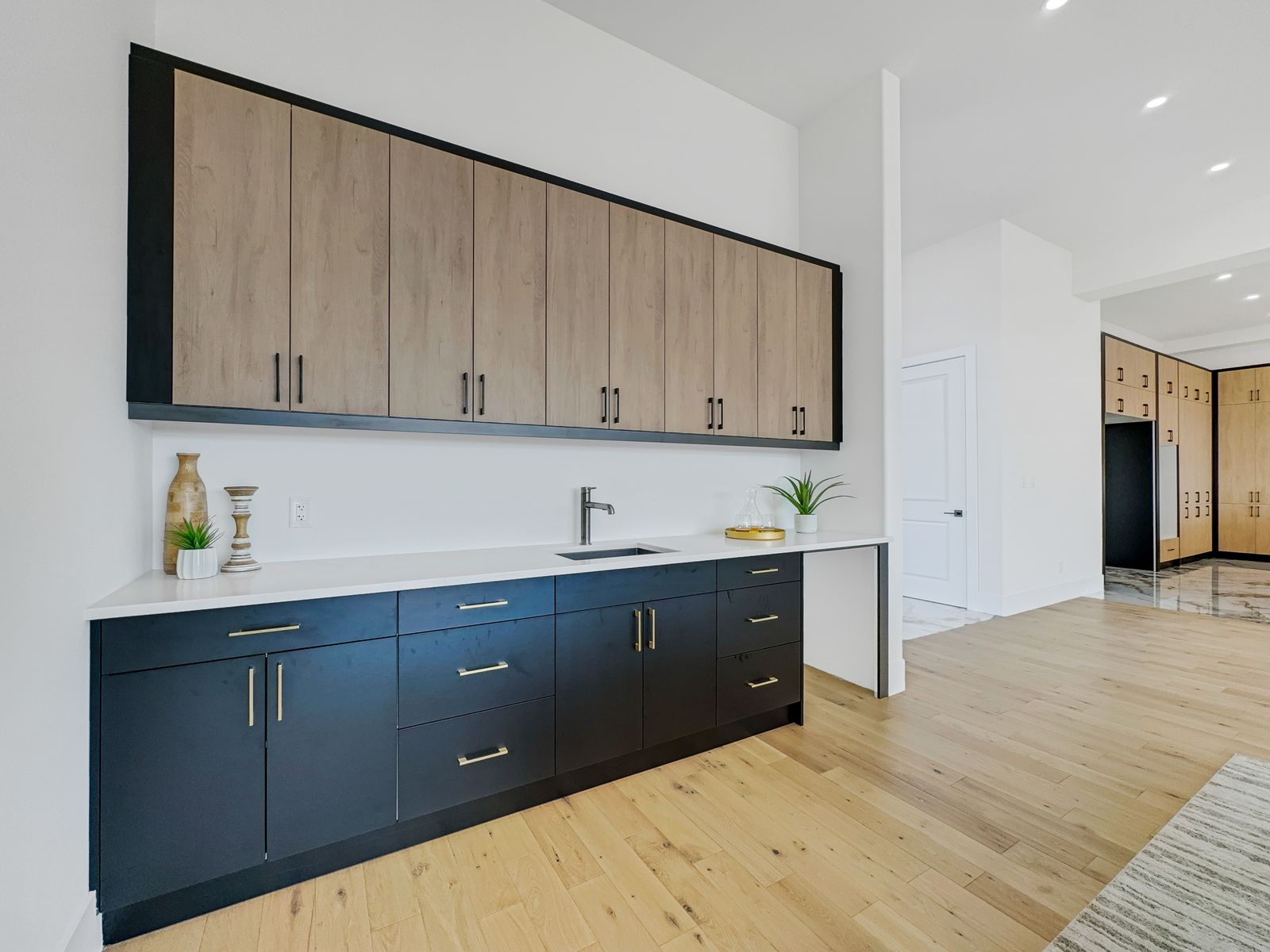 Two-tone custom cabinetry in a completed Carnaby home